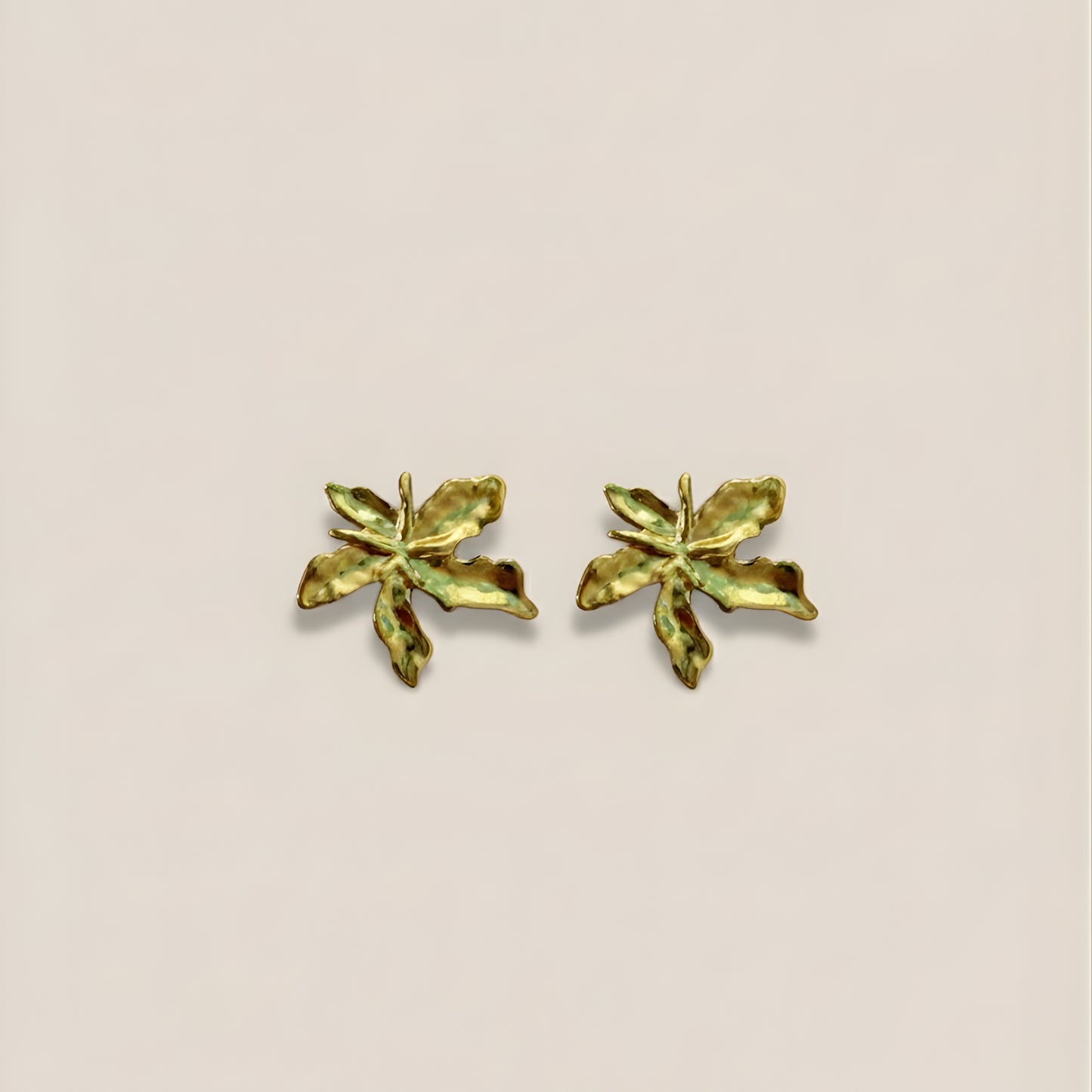 Gold plated leave themed earrings