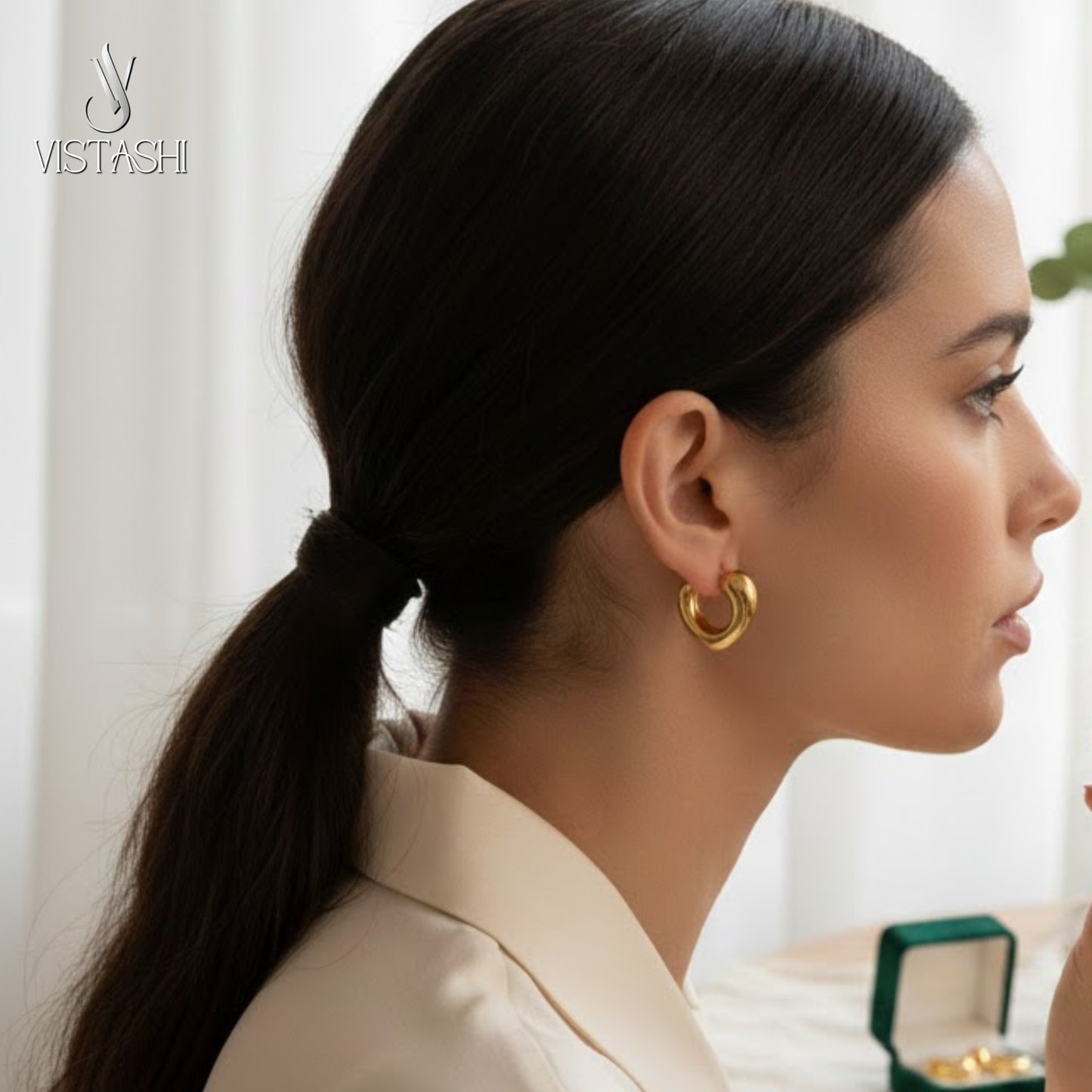 Gold plated heart themed hoop earrings