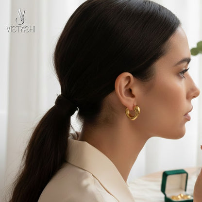 Gold plated heart themed hoop earrings