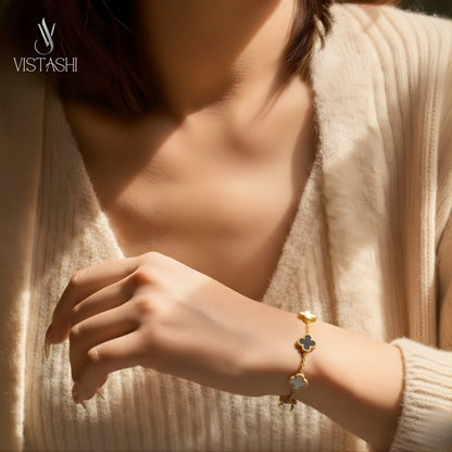 Gold plated anti tarnish black and white clove bracelet