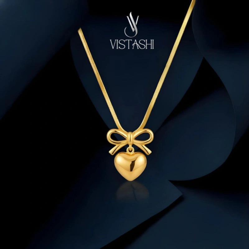 Bow with Heart Pendant