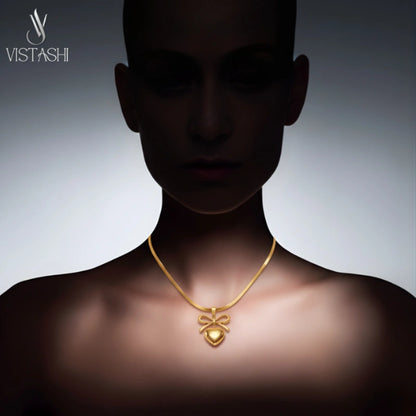 Bow with Heart Pendant