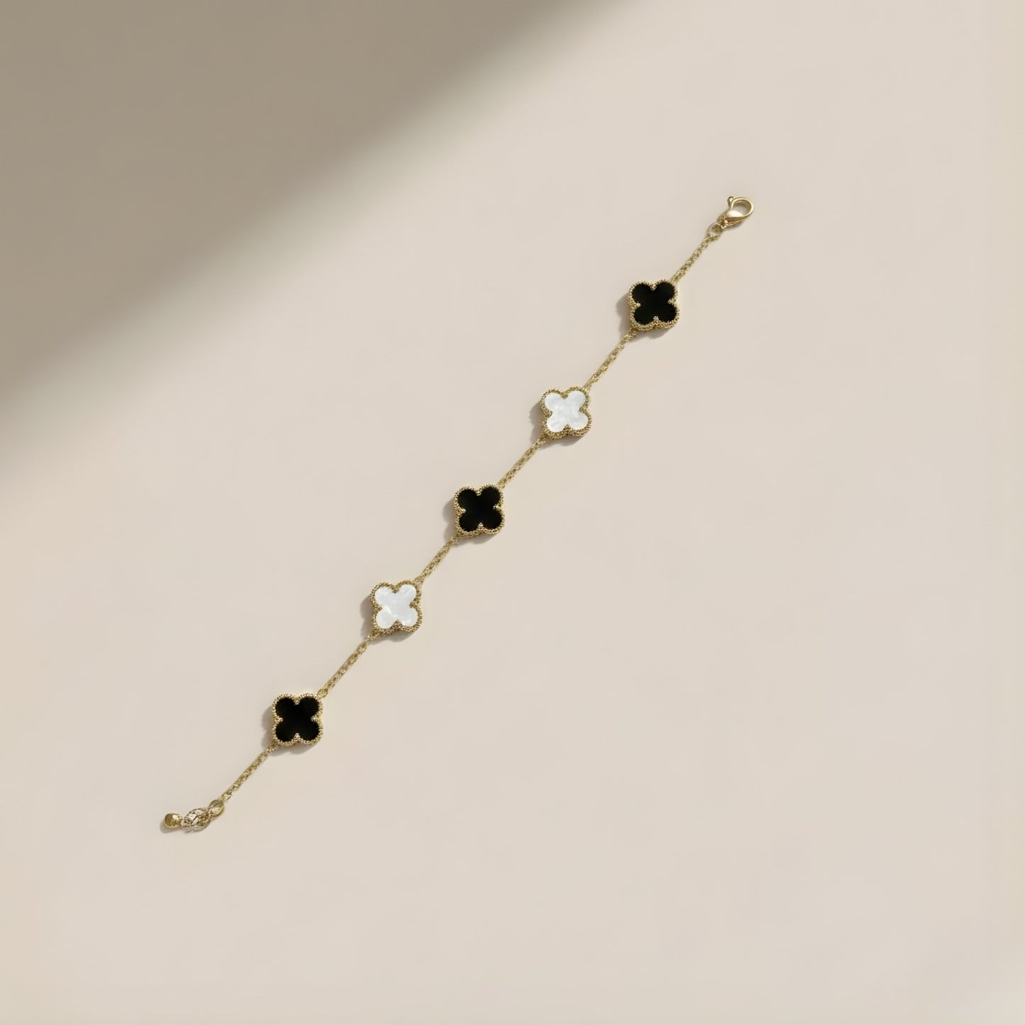 Gold plated anti tarnish black and white clove bracelet